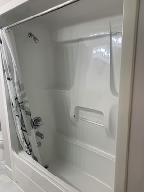 Hair dryer, towels, soap, toilet paper
