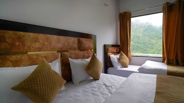 Chambre Deluxe double ou avec lits jumeaux, patio, vue sur la montagne