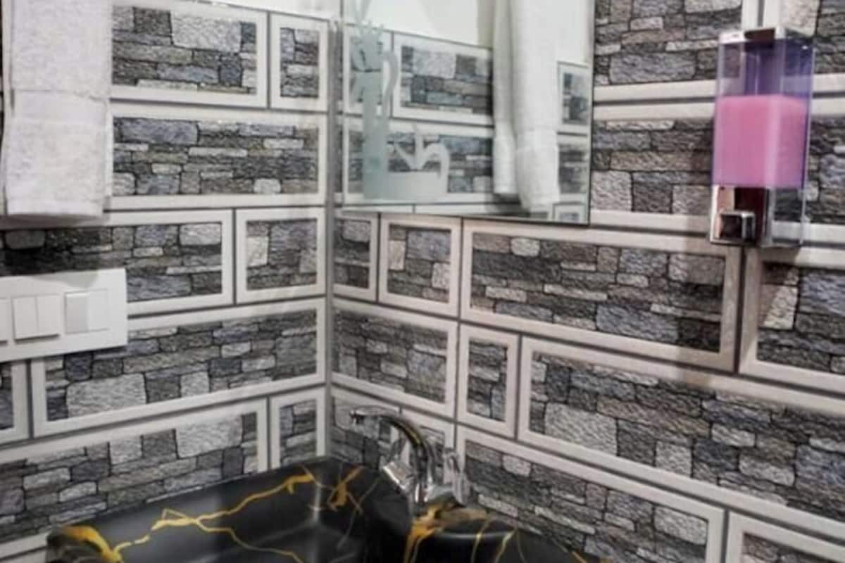 Phòng đôi hoặc 2 giường đơn Deluxe, sân hiên, quang cảnh núi | Phòng tắm