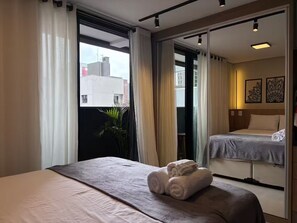 Iron/ironing board, WiFi - Spacious studio apartment in Batel, complete condominium. (Curitiba)