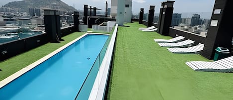 Family Apartment, 2 Bedrooms, Air conditioning, Garden View | Pool | Seasonal outdoor pool