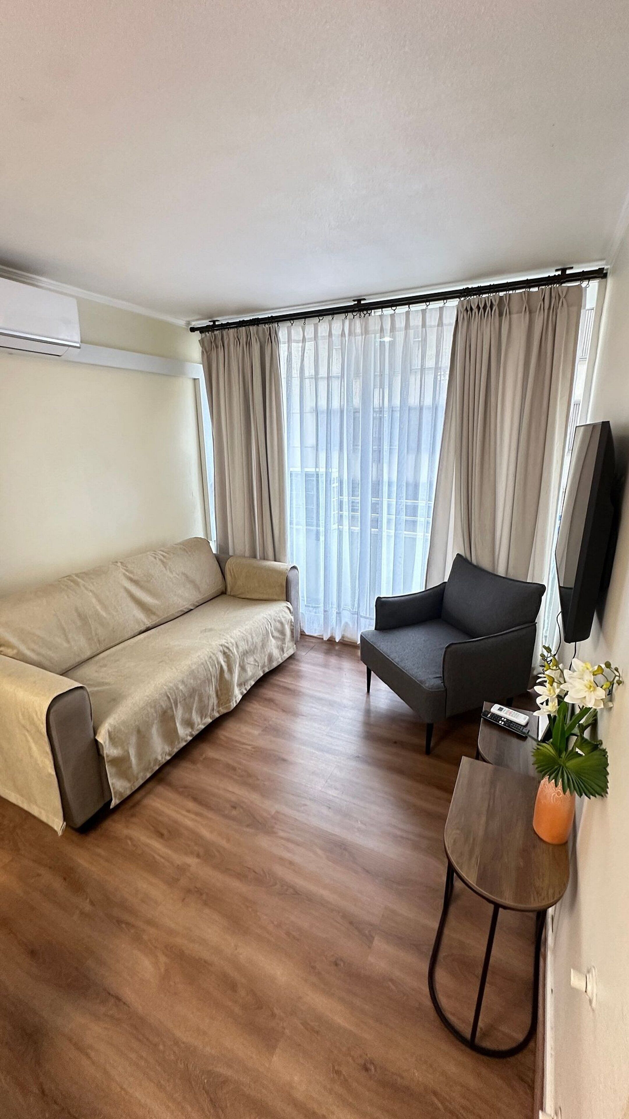 Family Apartment, 2 Bedrooms, Air conditioning, City View | Living area | 42-inch flat-screen TV with digital channels