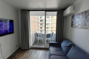 Family Apartment, 3 Bedrooms, Air conditioning, City View | Living area | 42-inch flat-screen TV with digital channels - Andino Suites (Santiago)