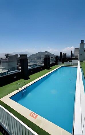Family Apartment, 3 Bedrooms, Air conditioning, Garden View | Pool | Seasonal outdoor pool - Andino Suites (Santiago)