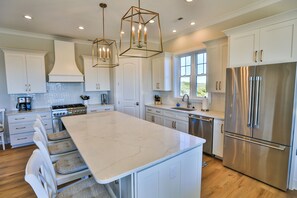 Fridge, microwave, oven, stovetop - Second Row Ocean View Retreat w/ Pool and Elevator (Emerald Isle)