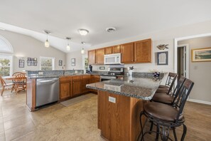 Fridge, microwave, oven, stovetop - Spacious Oceanview Home | Short Walk to Beach | Pool (Emerald Isle)