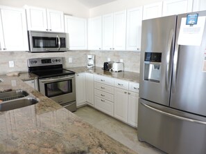 Fridge, microwave, oven, stovetop - Oceanfront 4BR Home with Decks & Beach Access (Indian Beach)