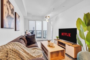 Quarto luxo, sacada | Área de estar