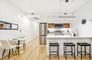 Private kitchen - Chic Downtown Living | Sauna, Gym + Pool Table Access (Calgary)