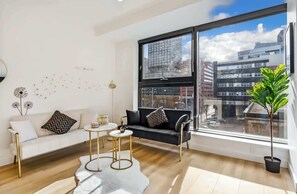 Living area - Downtown Escape | Gym Access, Sauna & Pool Table Fun (Calgary)