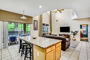 House, Multiple Beds, Pool Access, Pool View (Emerald Island Resort) | Living area - Charming Home With Pool, Pool Spa, Lanai, Central AC, & Washer/dryer (Kissimmee)