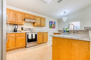 House, Multiple Beds, Pool Access, Pool View (Good Vibes - Cumbrian Lakes Villas) | Private kitchen - Stylish Retreat With a Private, Heated Pool, Central AC, & Garage Game Room (Kissimmee)