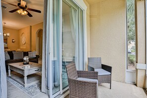 Condo, Multiple Beds, Pool Access, Garden View (Yellow Starfish - Windsor Hills) | Terrace/patio - Friendly Condo With Pool and hot tub Access, Wifi, Central AC, and Private W/D (Kissimmee)