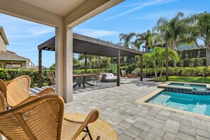 Outdoor pool - Dog-friendly Getaway With Private Pool + Spa, Putting Green, Patio, & Game Room (Kissimmee)