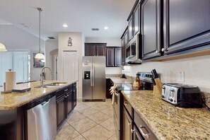 House, Multiple Beds, Pool Access, Pool View (Palm Bouquet - Paradise Palms Resort) | Private kitchen - Dog-friendly Home With Private Pool, High-speed Wifi, Central AC, & Washer/dryer (Kissimmee)