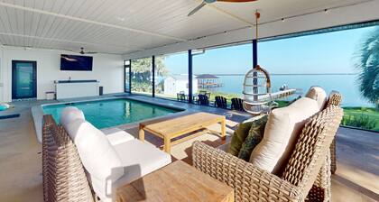 Renovated Lakefront Retreat With Screened Pool, Private Dock, Patio, Grill & W/D