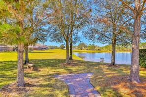 House, Multiple Beds, Pool Access, Pool View (Warm Welcomes on Woodcrest) | Water view - Peaceful Home With an Enclosed Patio, Pool, Grill, Washer/dryer, & AC (Clermont)