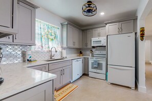 House, Multiple Beds, Hot Tub (Red Beach Lake Escape) | Private kitchen - Lakefront Home With Private Hot Tub, Central AC & Beach Access (Sebring)