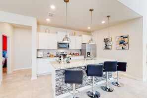 House, Multiple Beds, Pool Access, Pool View (Davenport Darling in Windsor Island) | Private kitchen - Exquisite Home With Pool, Pool Spa, Lazy River, Game Room, Firepit, & W/D (Davenport)