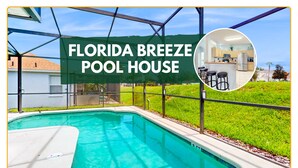 A pool house with a pool, a covered outdoor area, and a view of a kitchen with bar stools. - Single-story Home With Private Pool, Wifi, Central AC, WD and Full Kitchen (Haines City)