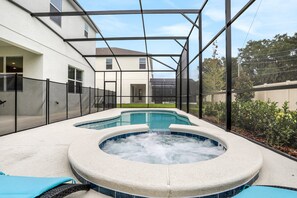 Outdoor pool - Dog-friendly Home With a Heated Pool, Pool Spa, In-home Theater, Lanai, & Patio (Kissimmee)