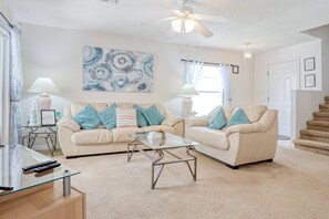 House, Multiple Beds, Pool Access, Pool View (Bright and Cozy Escape - The Hamlets) | Living area - Enchanting Dog-friendly Home With Pool, Lanai, Central AC, & Washer/dryer (Kissimmee)