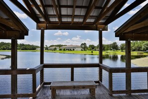House, Multiple Beds, Kitchen (Vaca on The Pond - Trafalgar Village) | Water view - Delightful Lakefront Townhome With Pool, Volleyball, Fast Wifi & AC (Kissimmee)