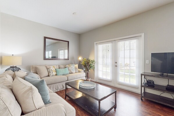 House, Multiple Beds, Pool Access, Garden View (Lucaya Village Vacay) | Living area - Spacious Family Friendly Home With Resort Style Shared Pool (Kissimmee)