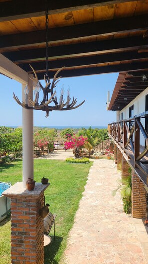 Terrace/patio - Casa Bugambilia: Sleeps 18, Pool, Ocean Views Near Costa Cumana Beach (Laguna Encantada)
