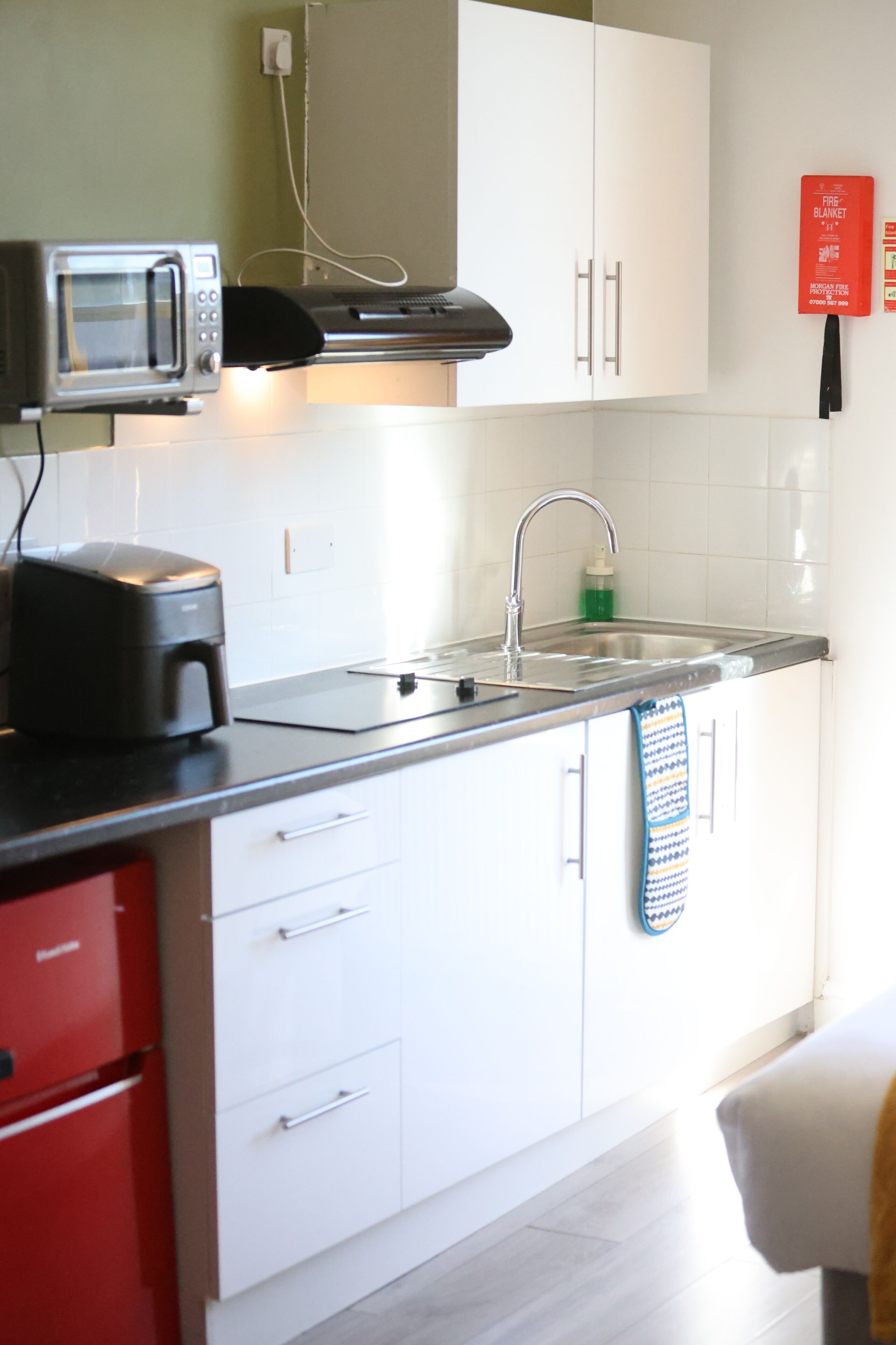 Fridge, microwave, stovetop, coffee/tea maker
