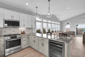 Fridge, microwave, oven, stovetop - Clean & Modern Home w/ 2 King Suites, Elevator, & Short Walk to Beach (Surf City)