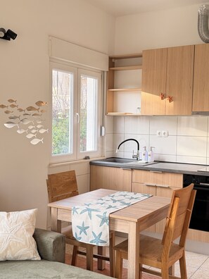 Fridge, oven, electric kettle, cookware/dishes/utensils