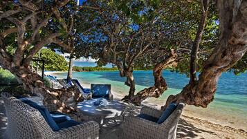 On the beach, sun loungers, beach towels