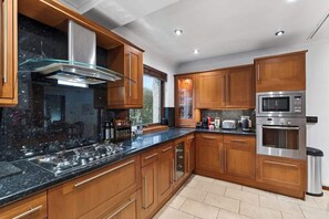 Fridge, microwave, oven, stovetop - Corner View - Welcoming family home with conservatory (Bearsden)