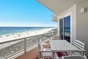 Outdoor dining - The Enclave 503 | Beachfront | Zero Entry Pool | Tennis Courts | My Beach Getaways (Orange Beach)