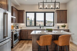 Fridge, microwave, oven, stovetop - Downtown WP Loft 57 I Rooftop Hot Tub & Lounge I Great Views I Discounted Attractions (Winter Park)