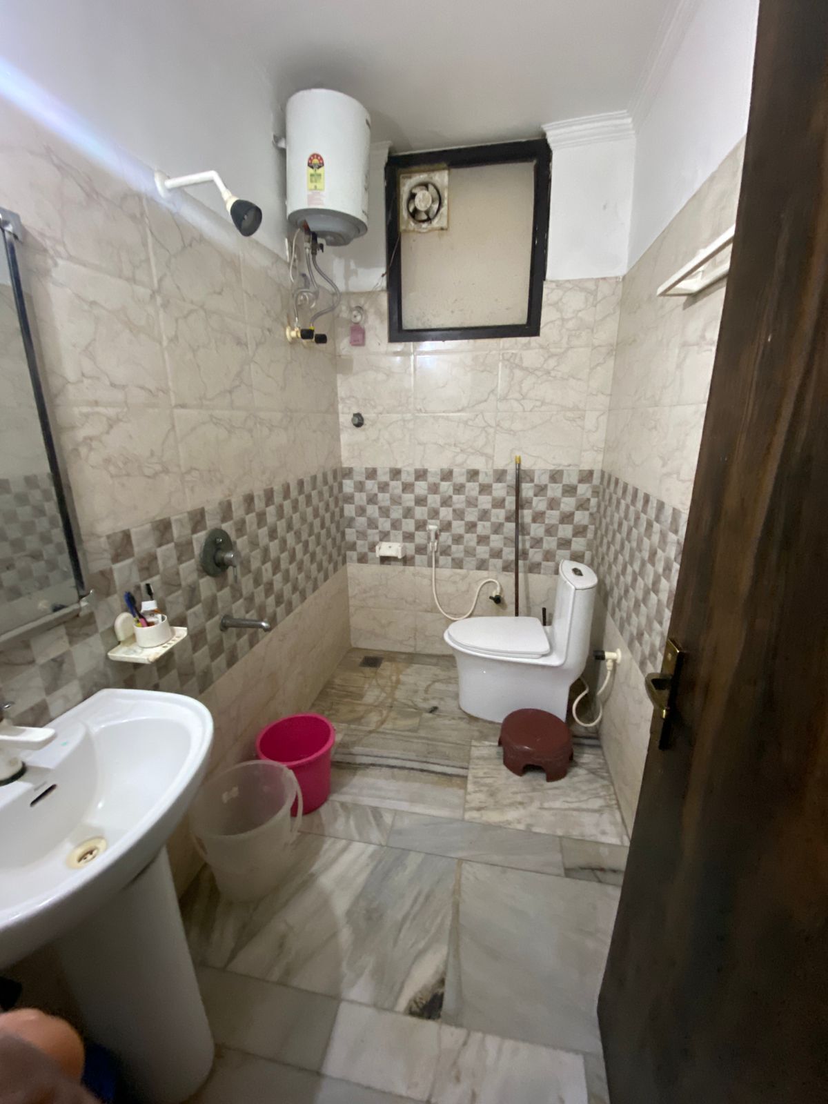 Shower, towels, soap, toilet paper