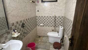 Shower, towels, soap, toilet paper