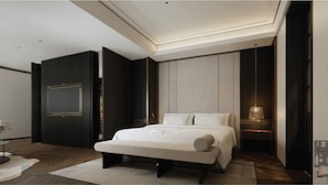 A modern bedroom with a large bed, a bench, a nightstand, and a wall-mounted TV. - HOWARD JOHNSON BY WYNDHAM TK Phnom Penh (Phnom Penh)