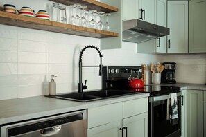 Fridge, microwave, oven, stovetop - Black Timber- 2 Bedroom Condo (Canmore)