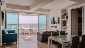 Deluxe Apartment, Sea View | Living area