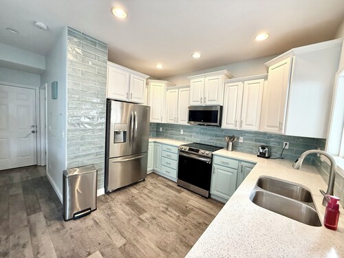 Spacious 4-bedroom house in beautiful West Jordan with AC and gym