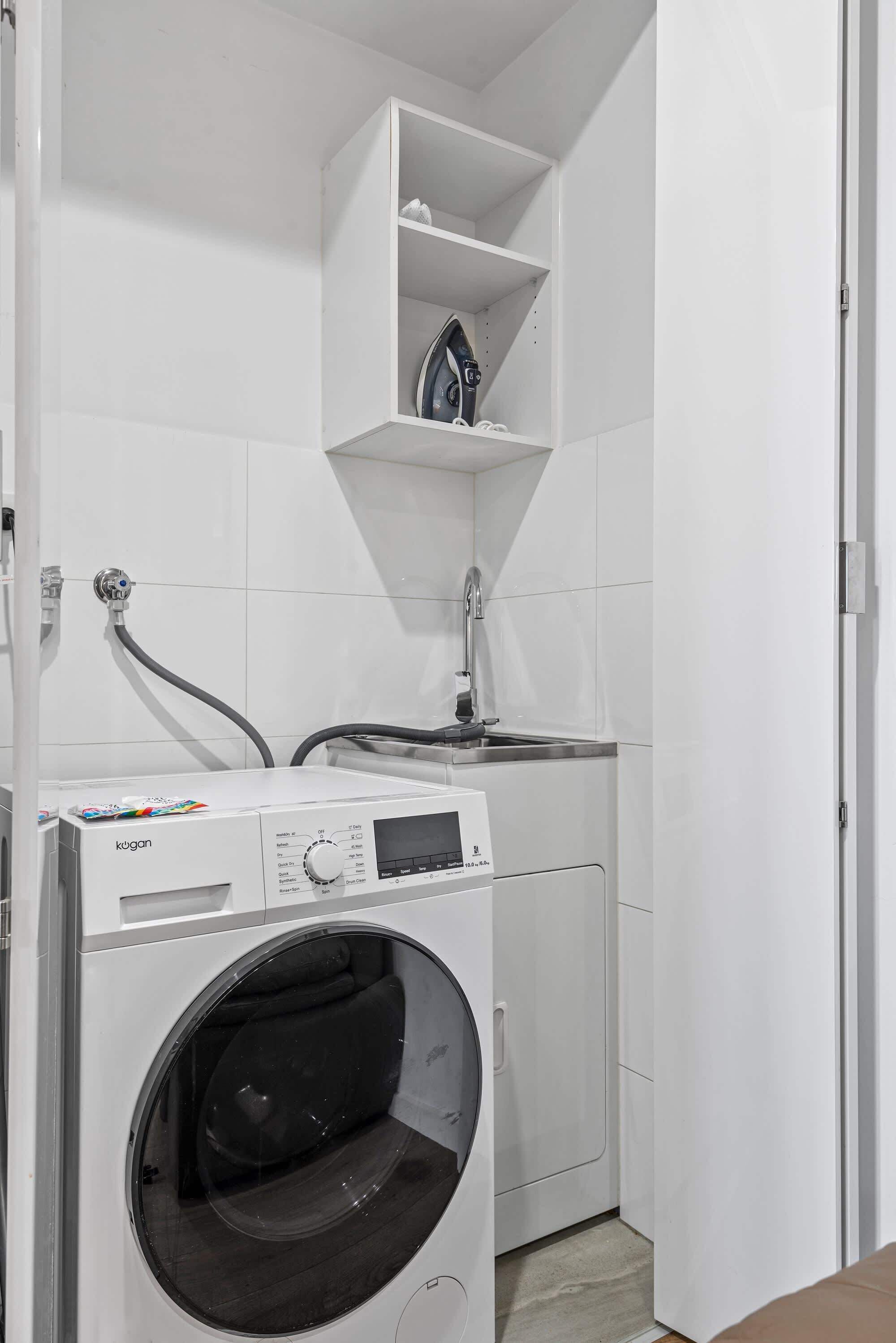 Shower, hair dryer, towels, shampoo
