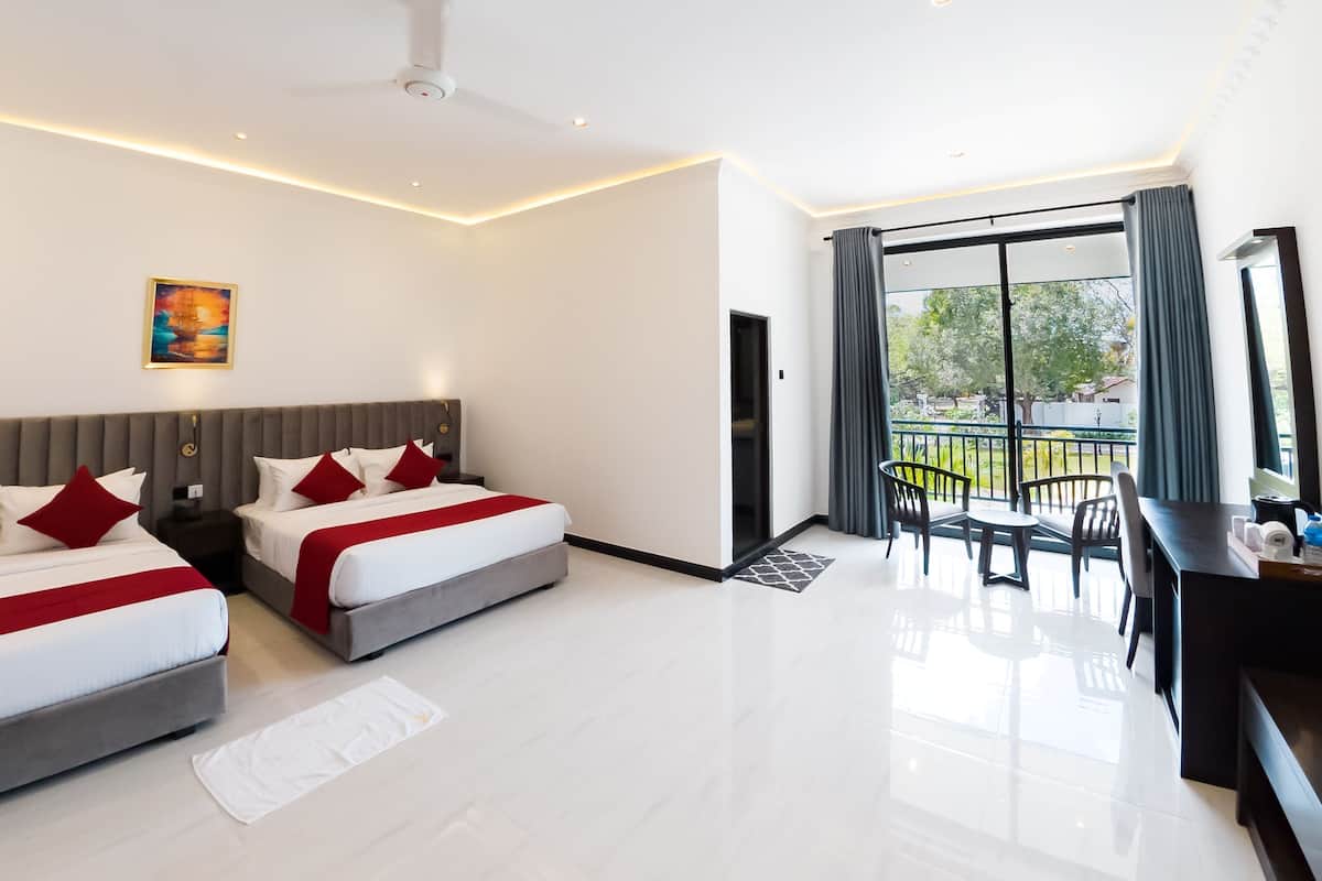 Neljän hengen deluxe-huone