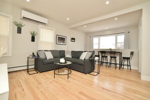 Living area - Modern 2BR Apt Near NYC, American dream, EWR, MetLife (Newark)