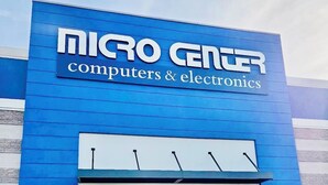 A Micro Center store with a blue facade and a large entrance. - Nice Modern Vintage House near Sky Harbor Airport (Phoenix)