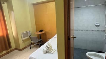Standard Single | Bathroom | Shower, free toiletries, towels, soap