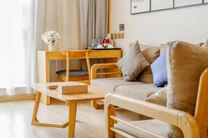 Design Double Room, Patio, City View | Living area | 79-cm TV with cable channels - Cosy Feeling Hotel  (Beijing)
