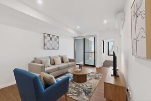 Living area - Bright Newly 2 Bed Apartment with Balcony Views (Cannington)