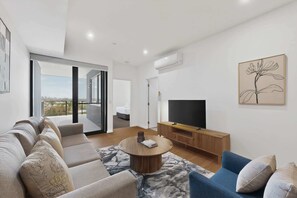 Living area - Bright Newly 2 Bed Apartment with Balcony Views (Cannington)